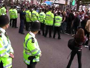 police keeping crowd at bay