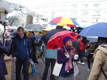 Flash mob of umbrellas in spite of sunny shining *february* day!